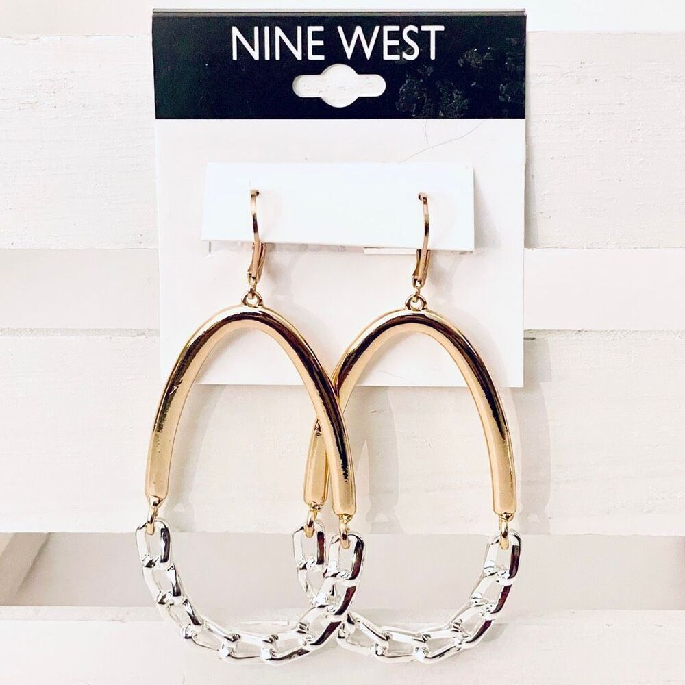 NWT Nine West statement earrings feature a two-tone design with a gold-plated ov